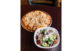 Pizza and a salad sounds like the perfect Thursday night pick-me up to us!