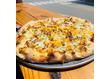 Cheesy Chicken & Bacon Pizza Special happening at A Slice Above, August 9th
